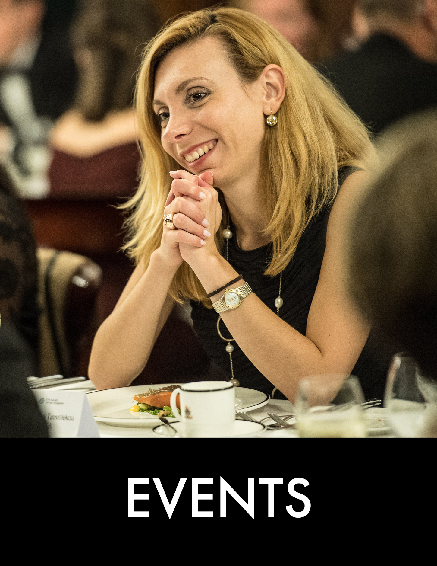 Woman with watch on at food table
