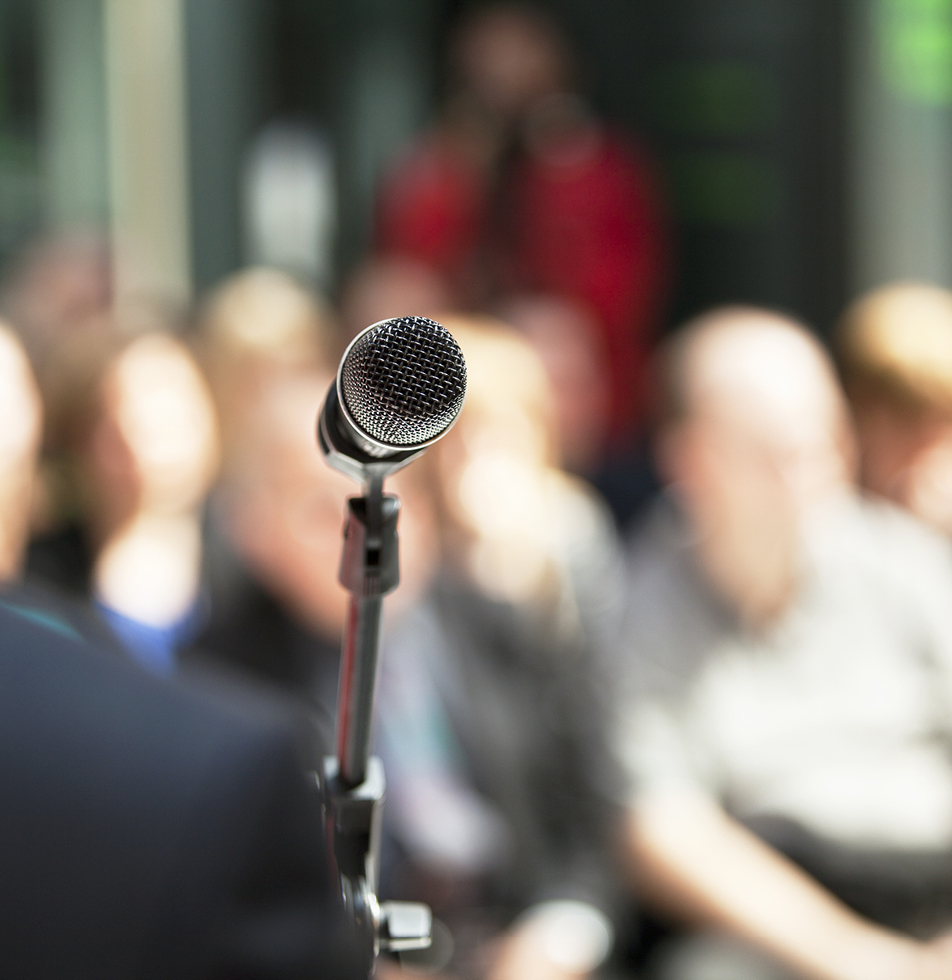 Microphone in front of an audience